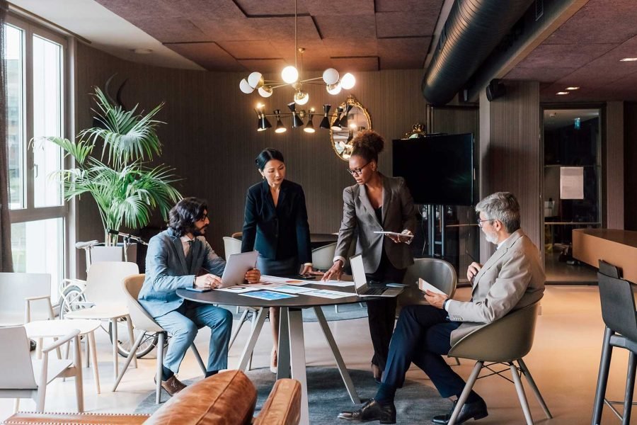 professional-team-engaged-in-a-meeting-at-a-stylis-YQF9YA7.jpg